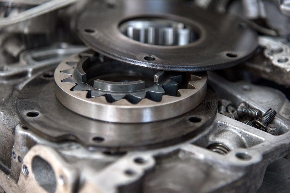 A Close Up of a Metal Gear in a Machine — Fosters Ace Auto Repairs In Aitkenvale, QLD