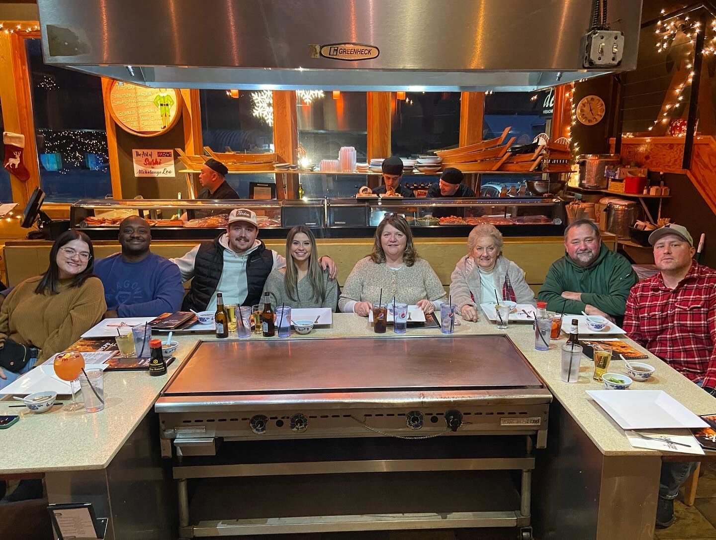 A family celebrating a night out at desaki