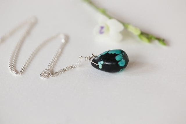 A pendant necklace creates a tender and meaningful scene for direct cremation Rio Rancho, NM