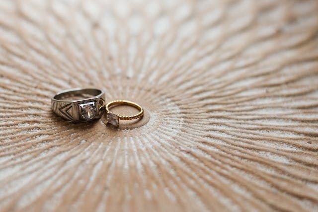 Two rings resting on a surface create a meaningful remembrance for direct cremation Rio Rancho, NM
