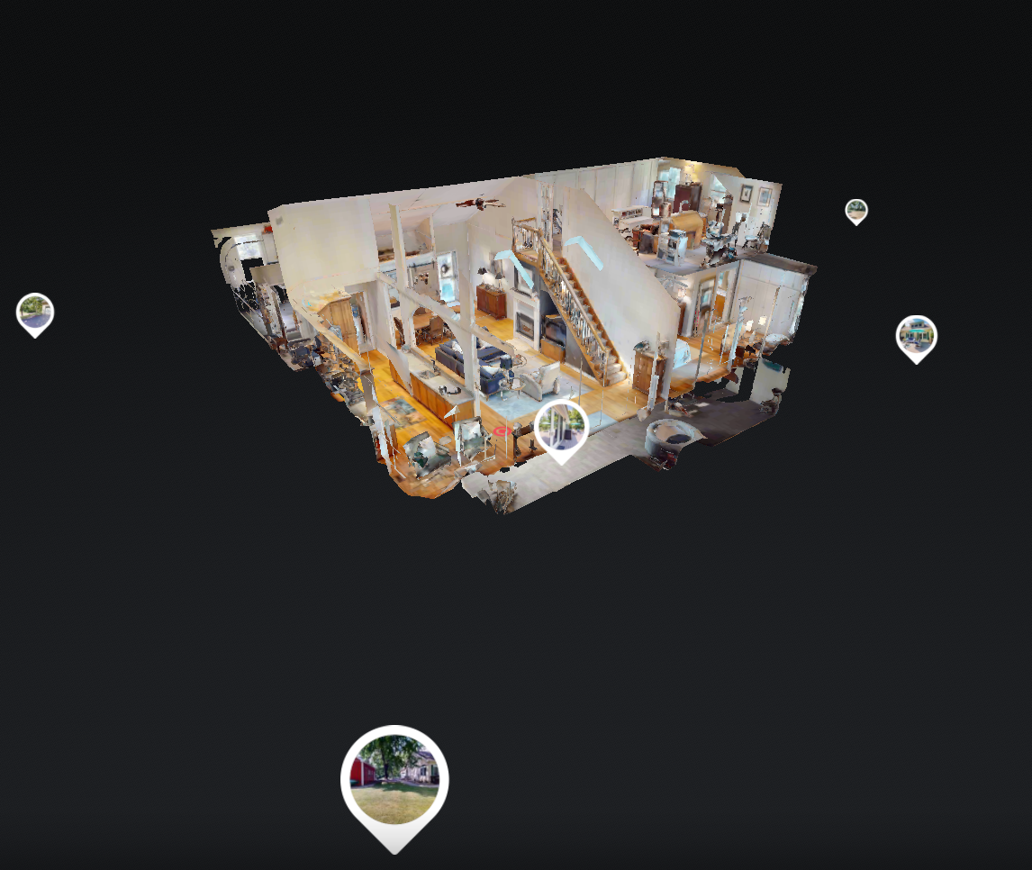 Interior view of a home renovation featuring an exposed steel support beam held up by several vertical temporary props.