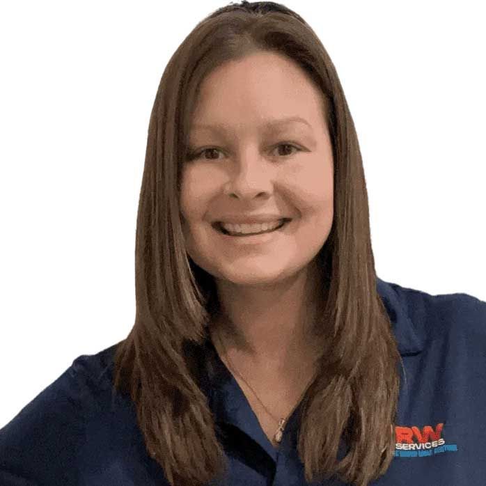Smiling Allison in a navy shirt with a red-and-white logo, against a white background