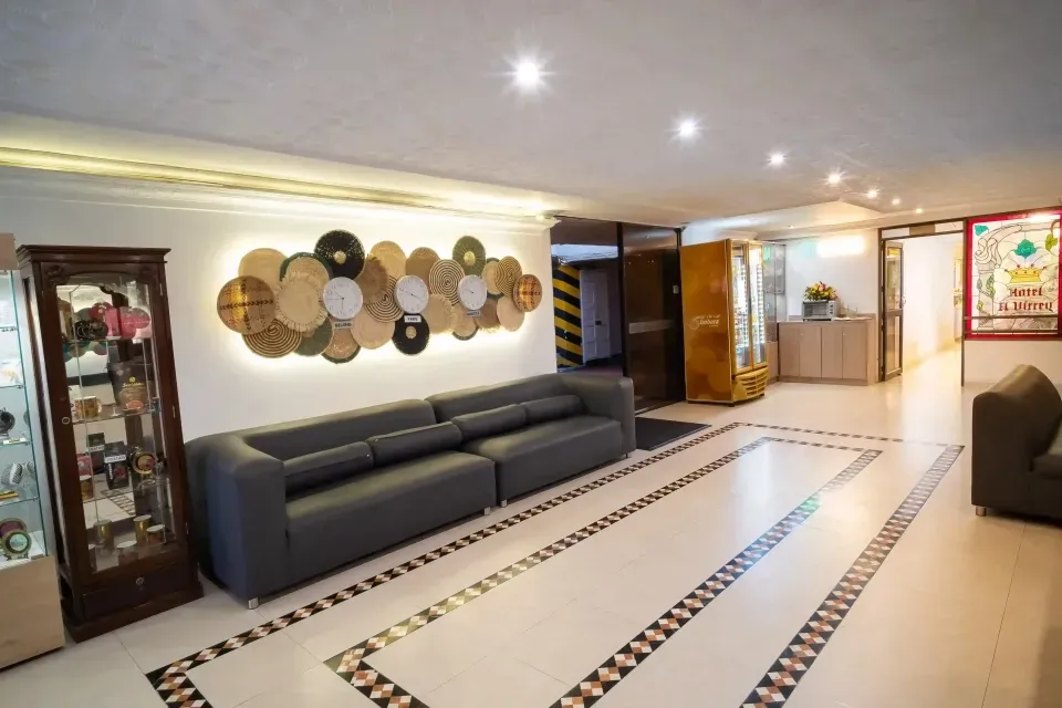 Hotel Virrey Central Bogotá lobby with warm decor and a strategic location in the city center.