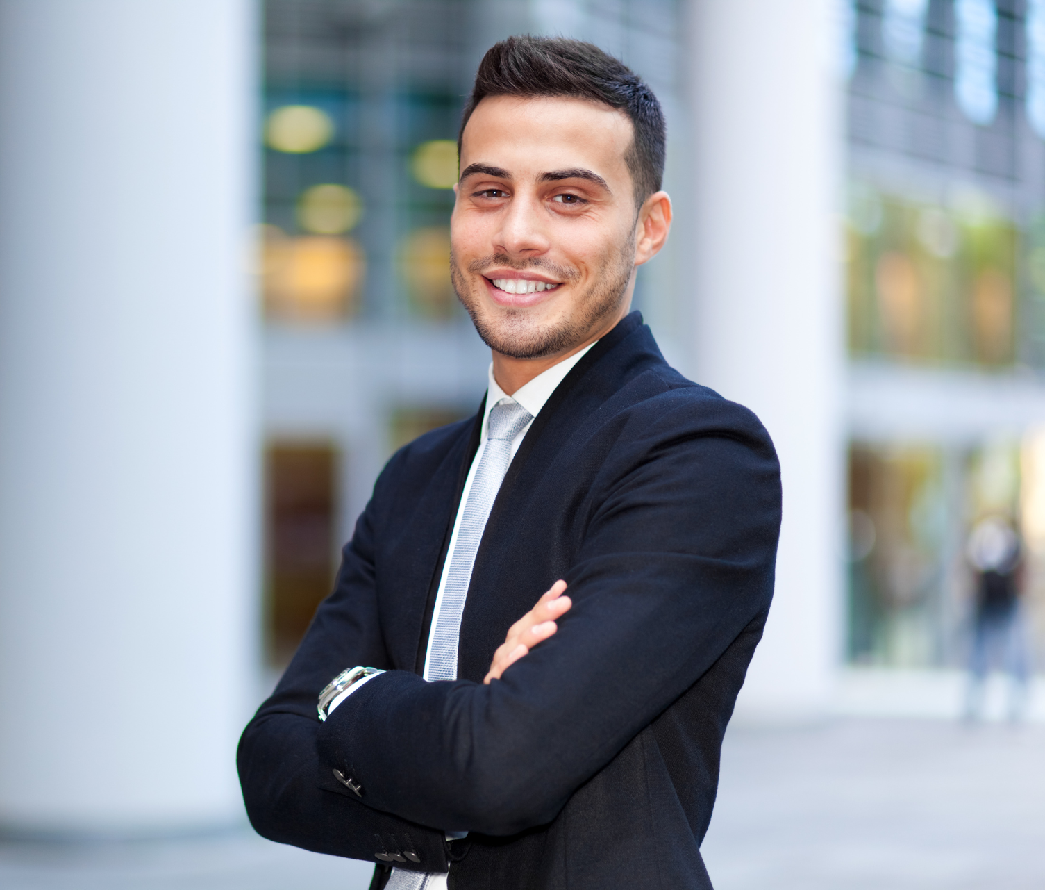 Confident man in a suit standing outdoors