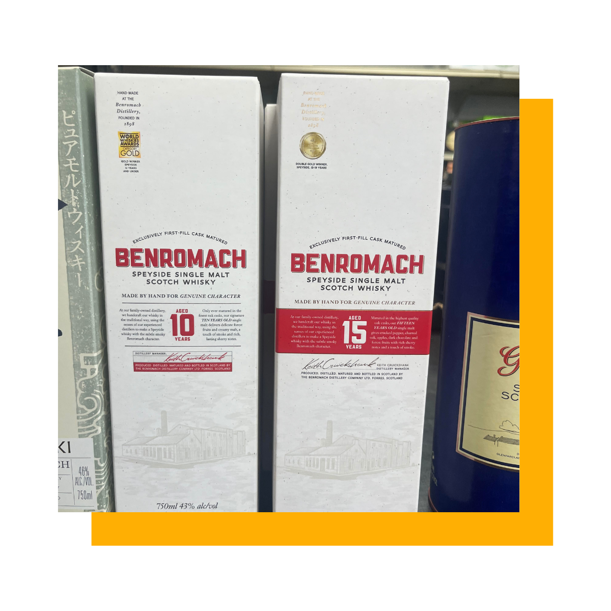 Two Benromach whisky boxes in a store, one marked