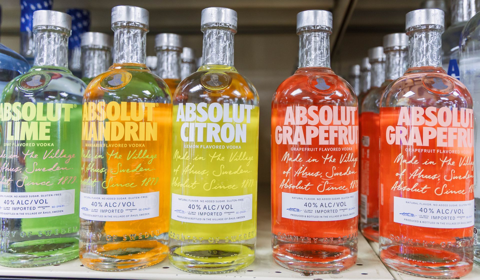 Bottles of flavored Absolut Vodka in lime, mandarin, citron, and grapefruit.