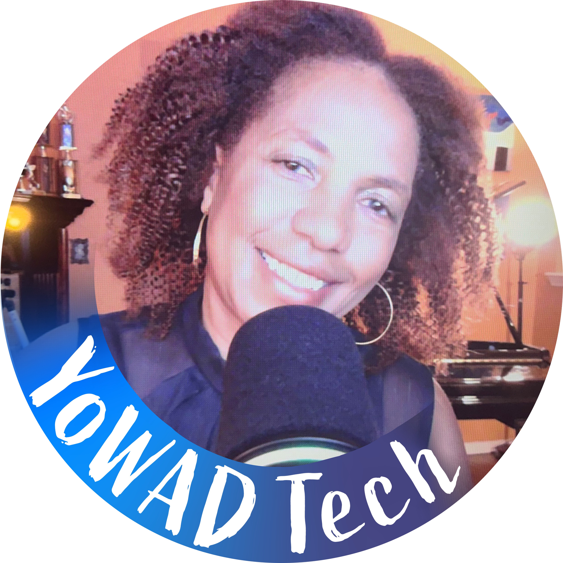 A circular logo showing a smiling person in front of a microphone with the text 