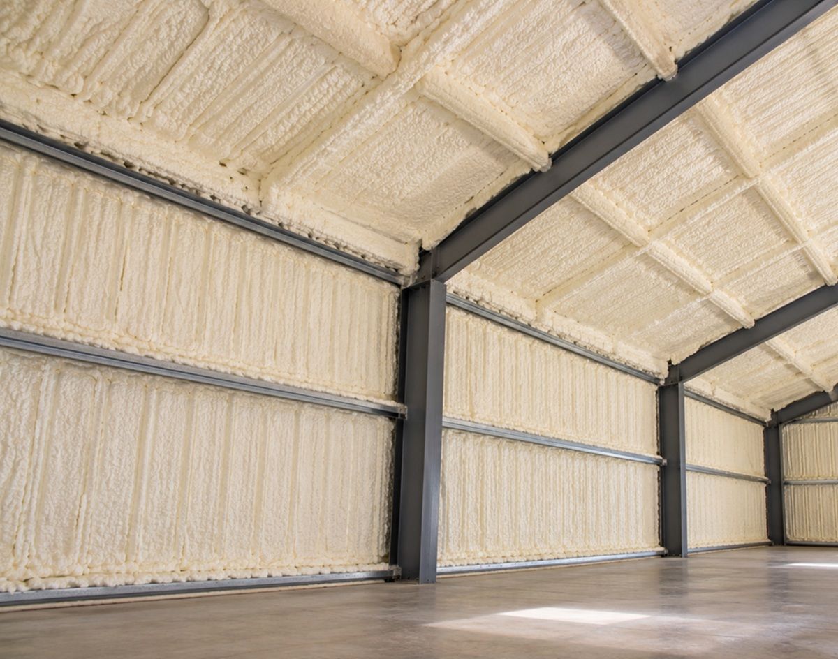 Completed spray foam insulation on metal building walls and ceiling in Bedford, MA
