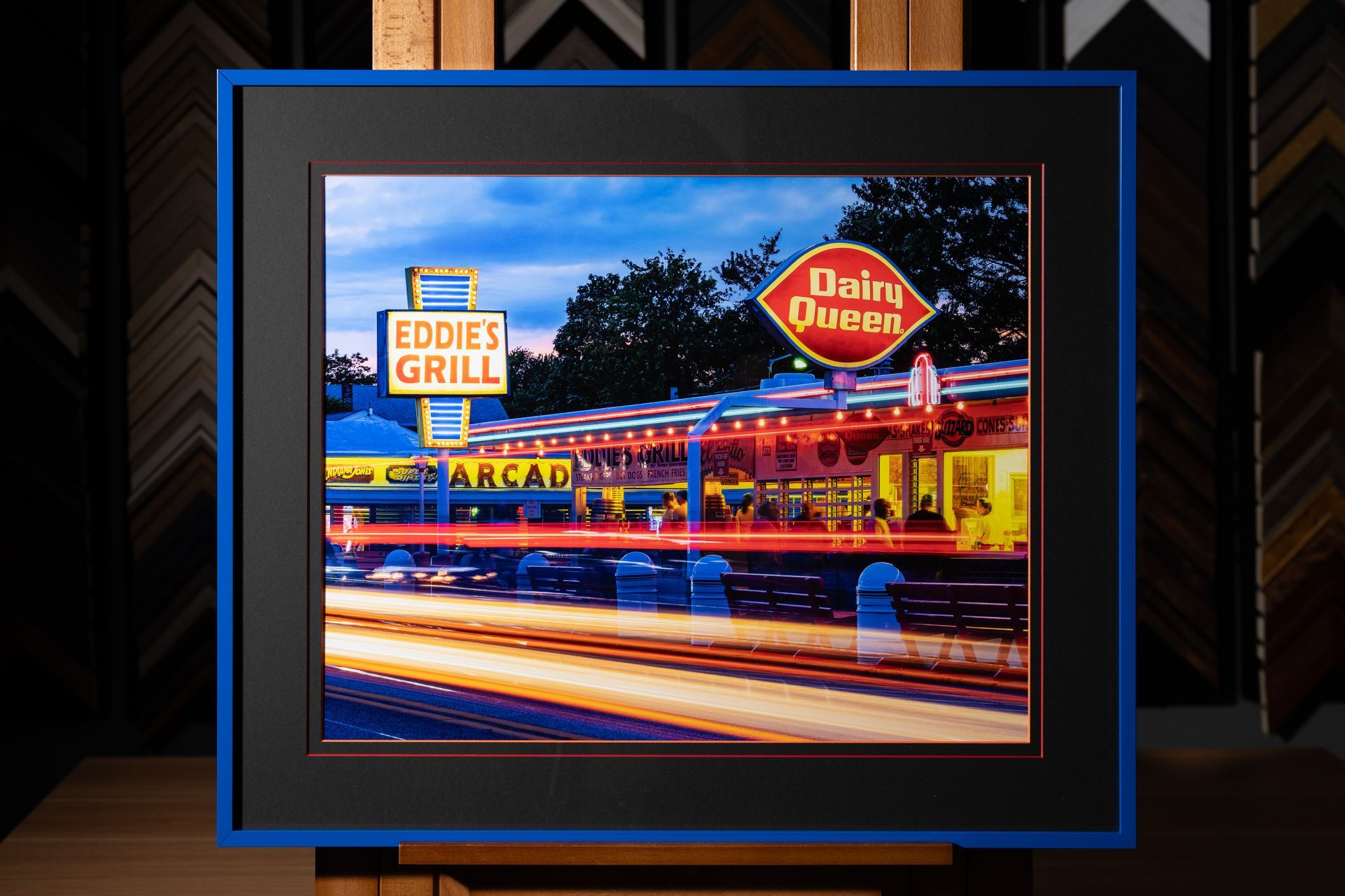 Custom framed nighttime photograph with colorful neon signs