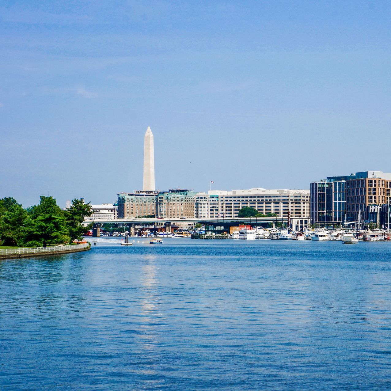 A large body of water with a city in the background.