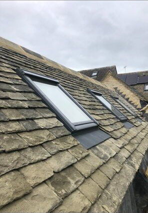 Velux window installed on a heritage slate roof.