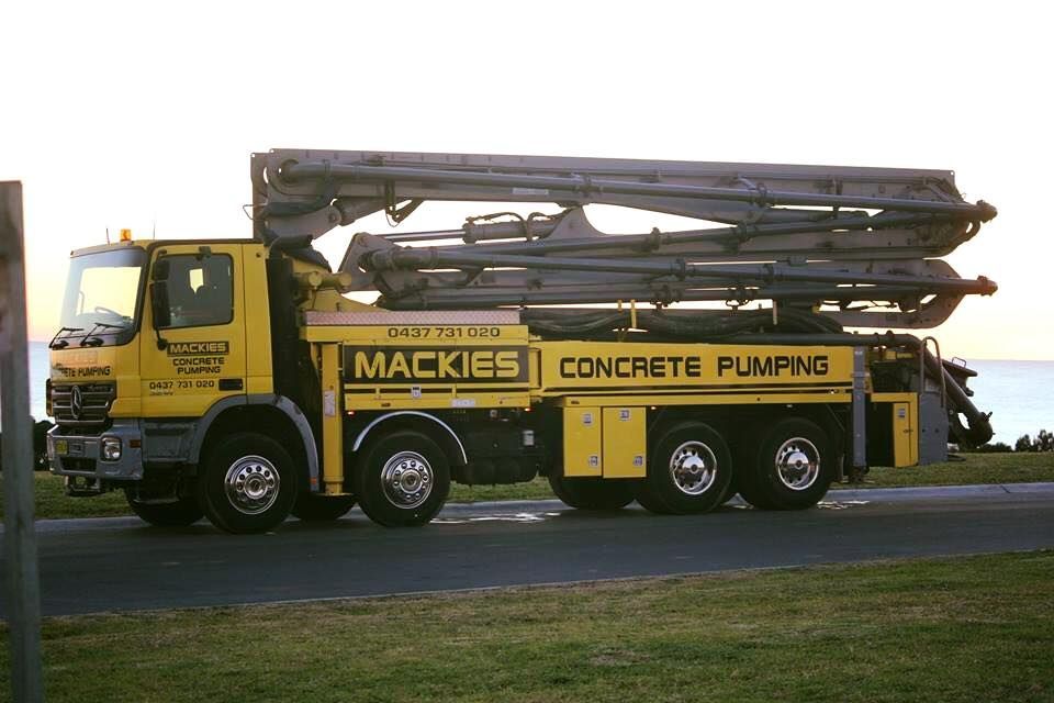 Concrete Pumping Truck on the Road — Mackie’s Concrete Pumping in Pampoolah, NSW