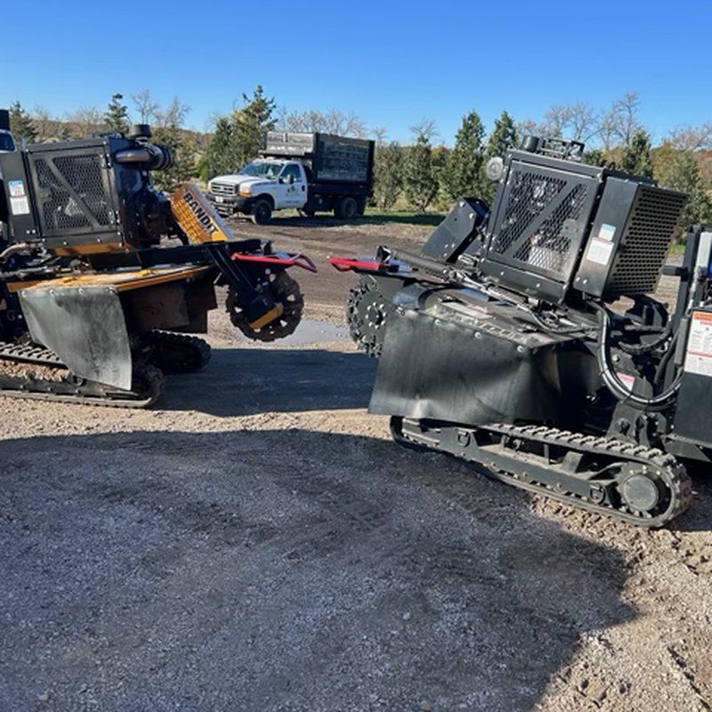Stump grinding equipment parked and ready for a job site in Kenosha, WI