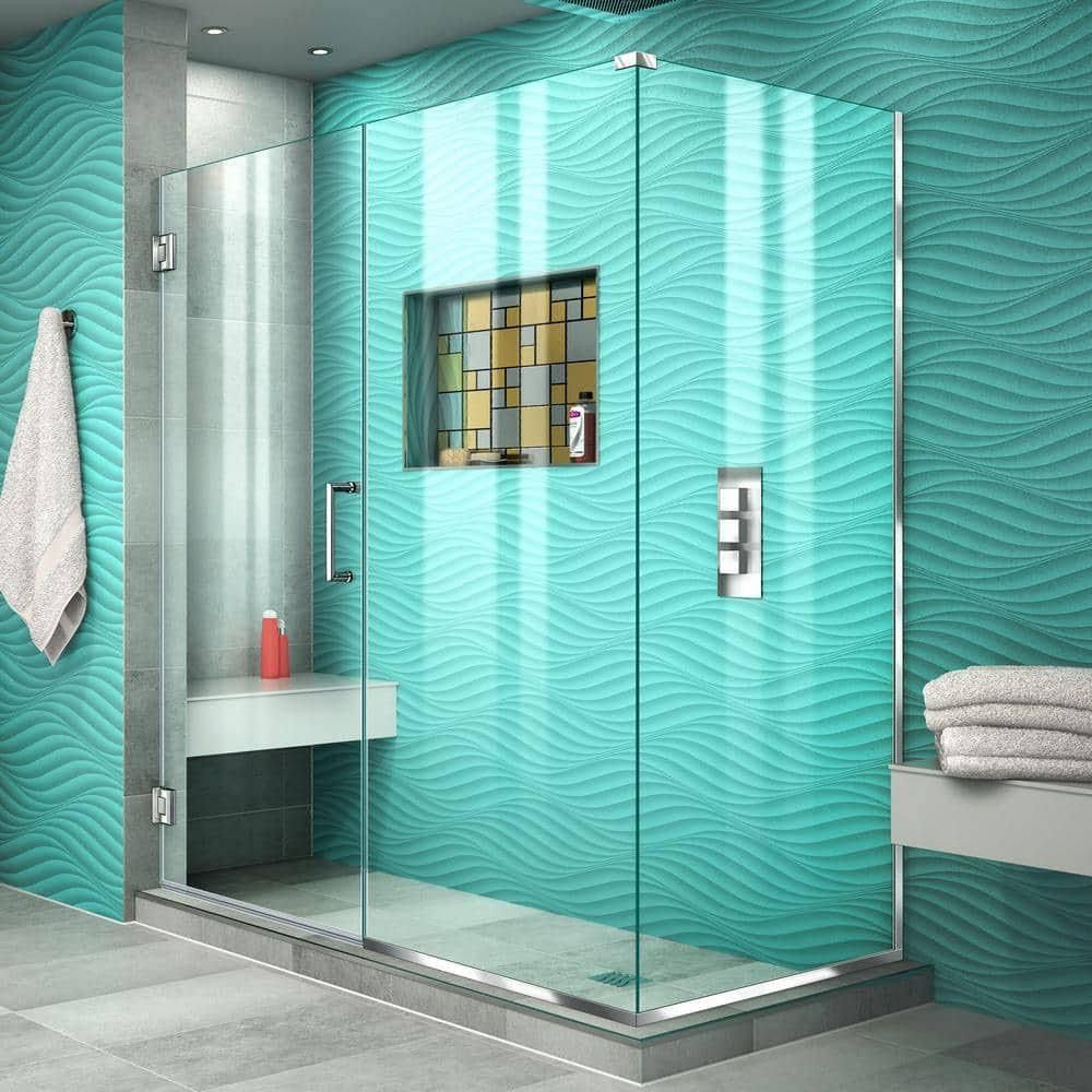 Modern turquoise tiled walk-in shower with glass doors, built-in bench, and wall niche.