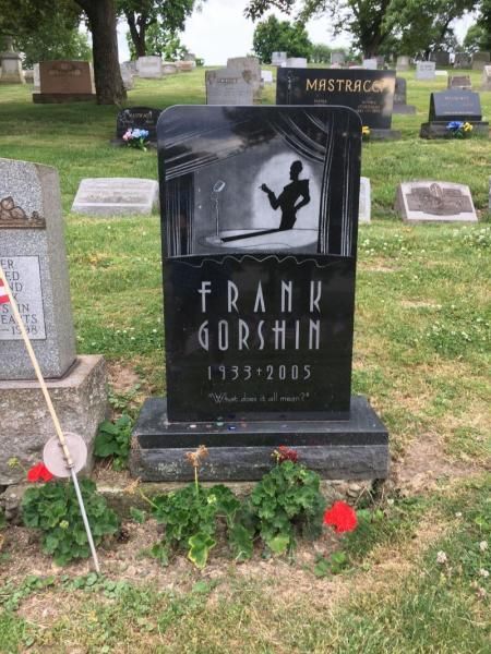 Frank gorshin 's grave in a cemetery with other graves