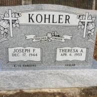A gravestone for joseph f. and theresa a. kohler in a cemetery.