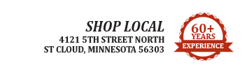 A sign that says shop local 60+ years experience