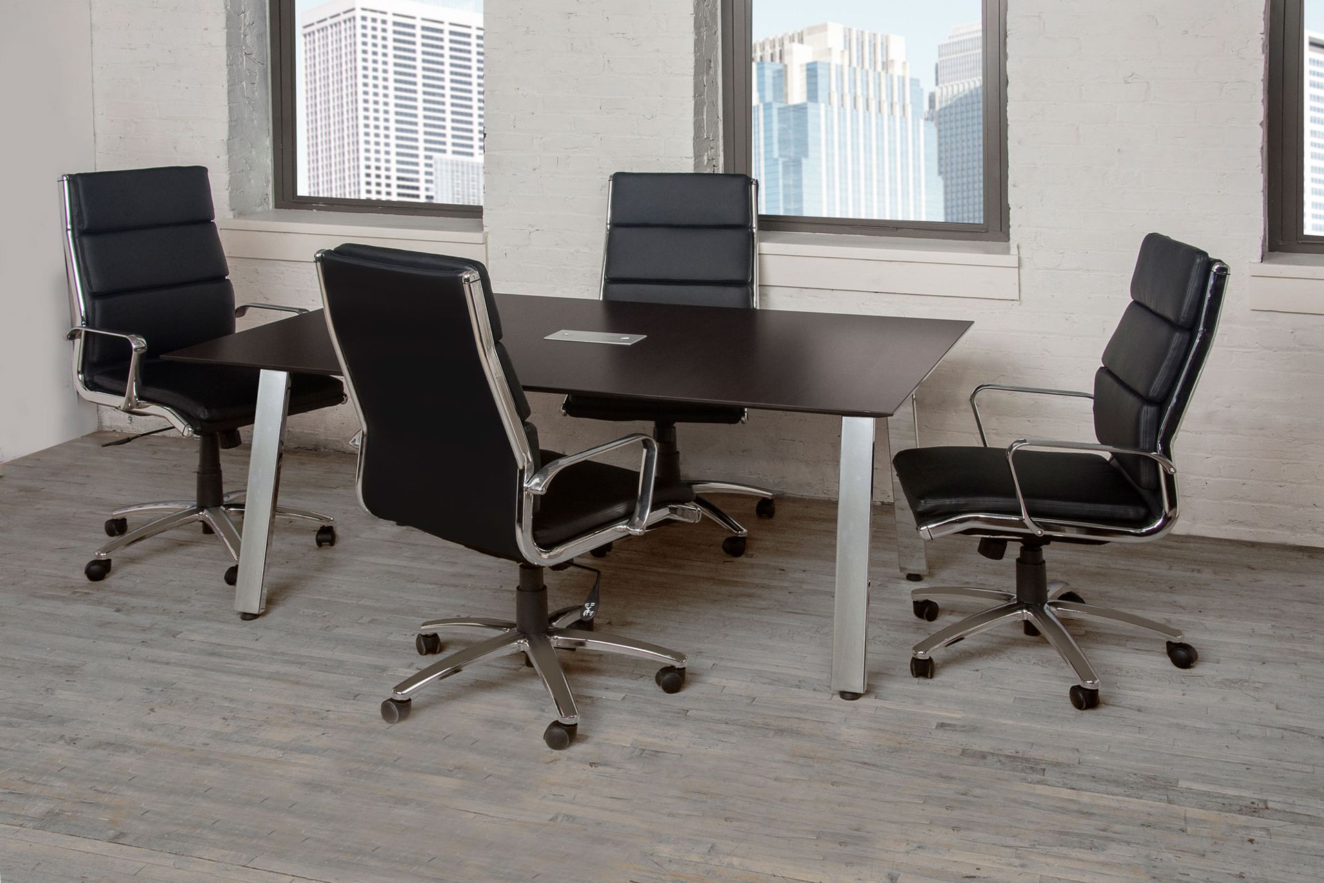 A conference room with a table and chairs and a window