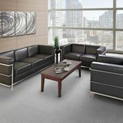 A living room filled with furniture and a coffee table.