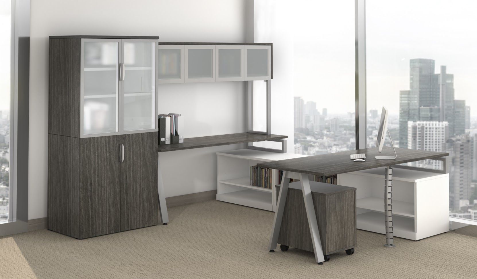 A room with a desk , cabinets , and a large window.