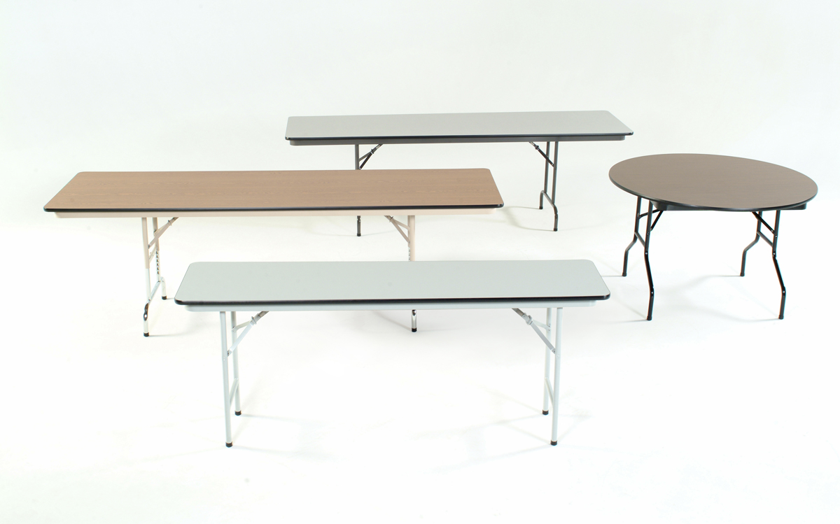 A group of folding tables are sitting next to each other on a white surface.