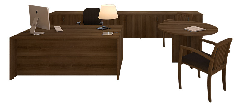 A wooden desk with a computer on it and a chair.