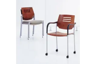 Two chairs are sitting next to each other on a white surface. One with arms and casters and one without.