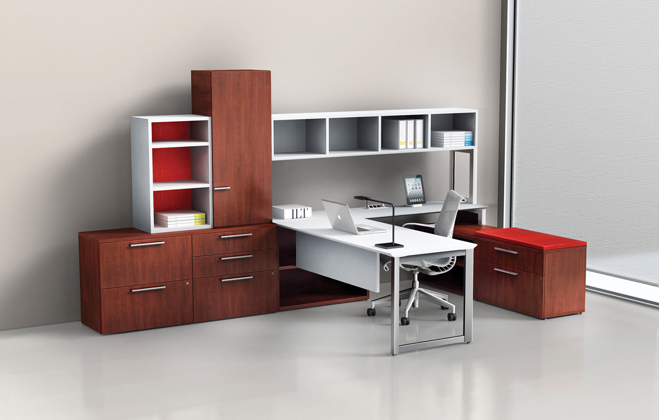 An office with a desk , chair , filing cabinets and shelves