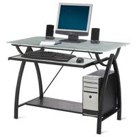 A computer desk with a computer , keyboard , mouse and speakers on it.