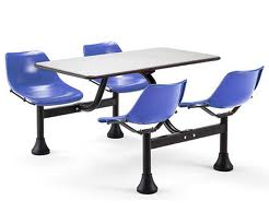 A table with four blue chairs attached to it on a white background.