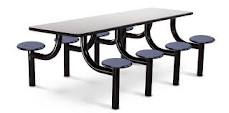 A picnic table with stools attached to it on a white background.