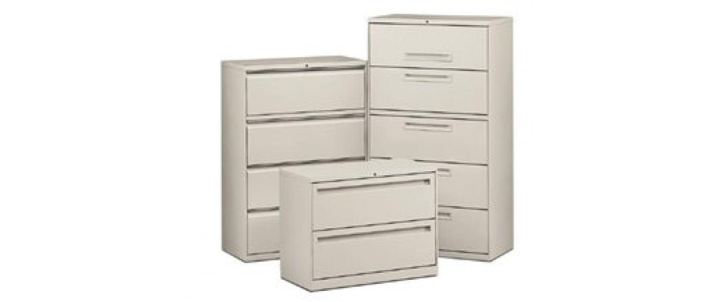A group of filing cabinets are stacked on top of each other on a white background.
