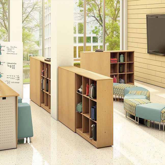 A room with a lot of shelves and a flat screen tv