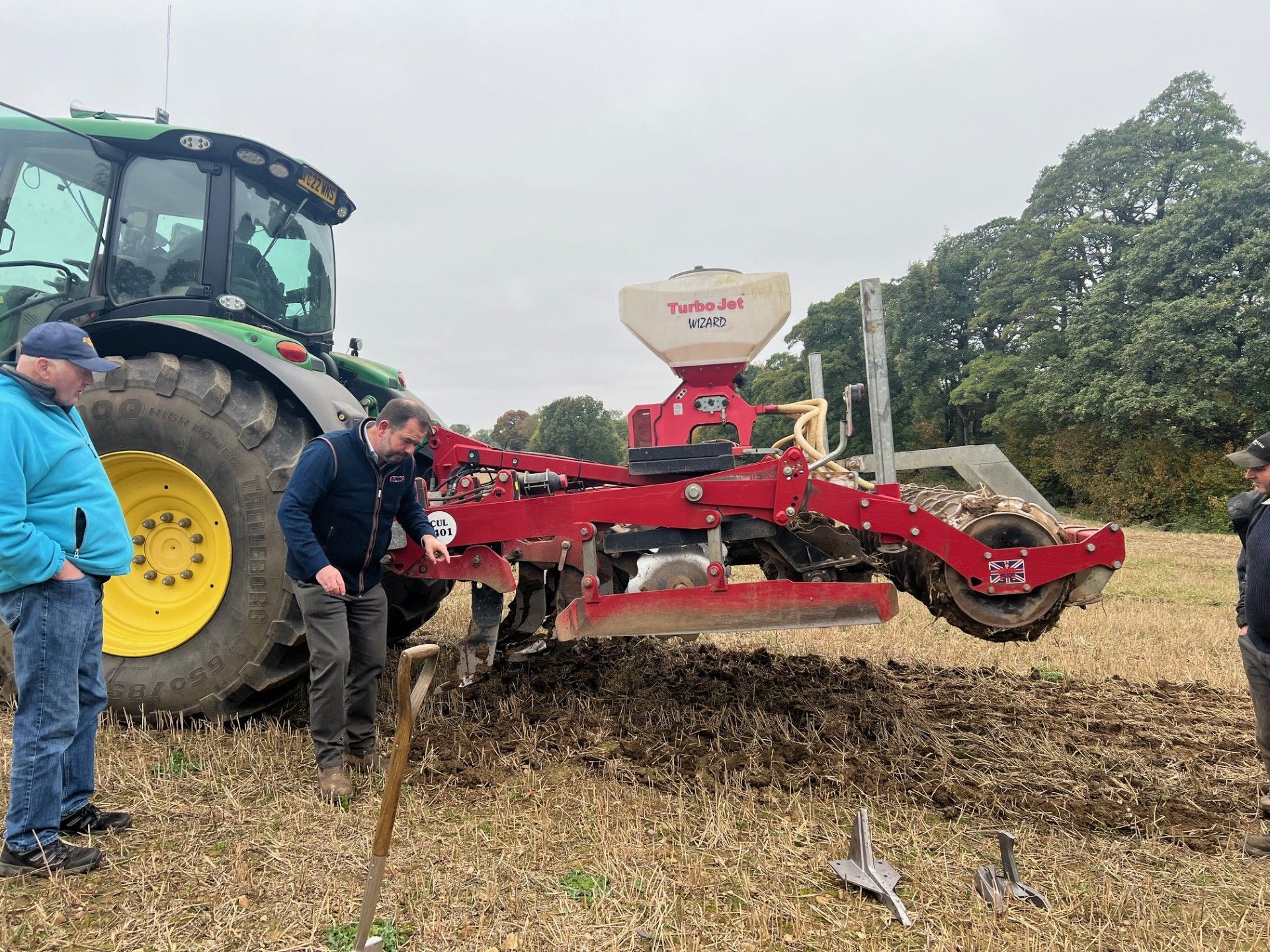 A tractor pulling the aerworx aerator to break up the pans deep in the soil.