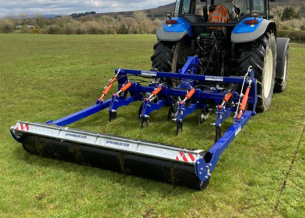 A tractor pulling the panbuster to break up the pans deep in the soil.