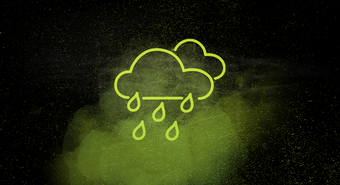 Neon yellow cloud with rain on a black smoky background indicating harsh conditions
