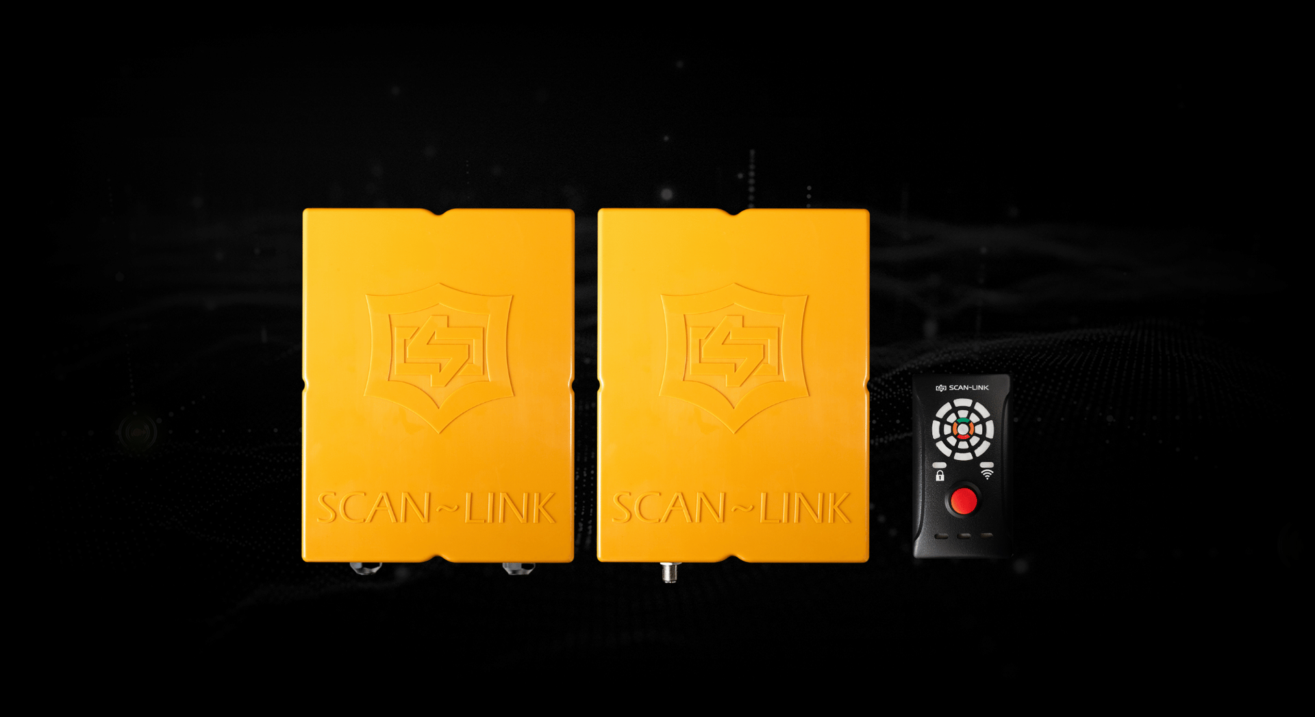 Two white Scan-Link boxes and a remote control on a black background.