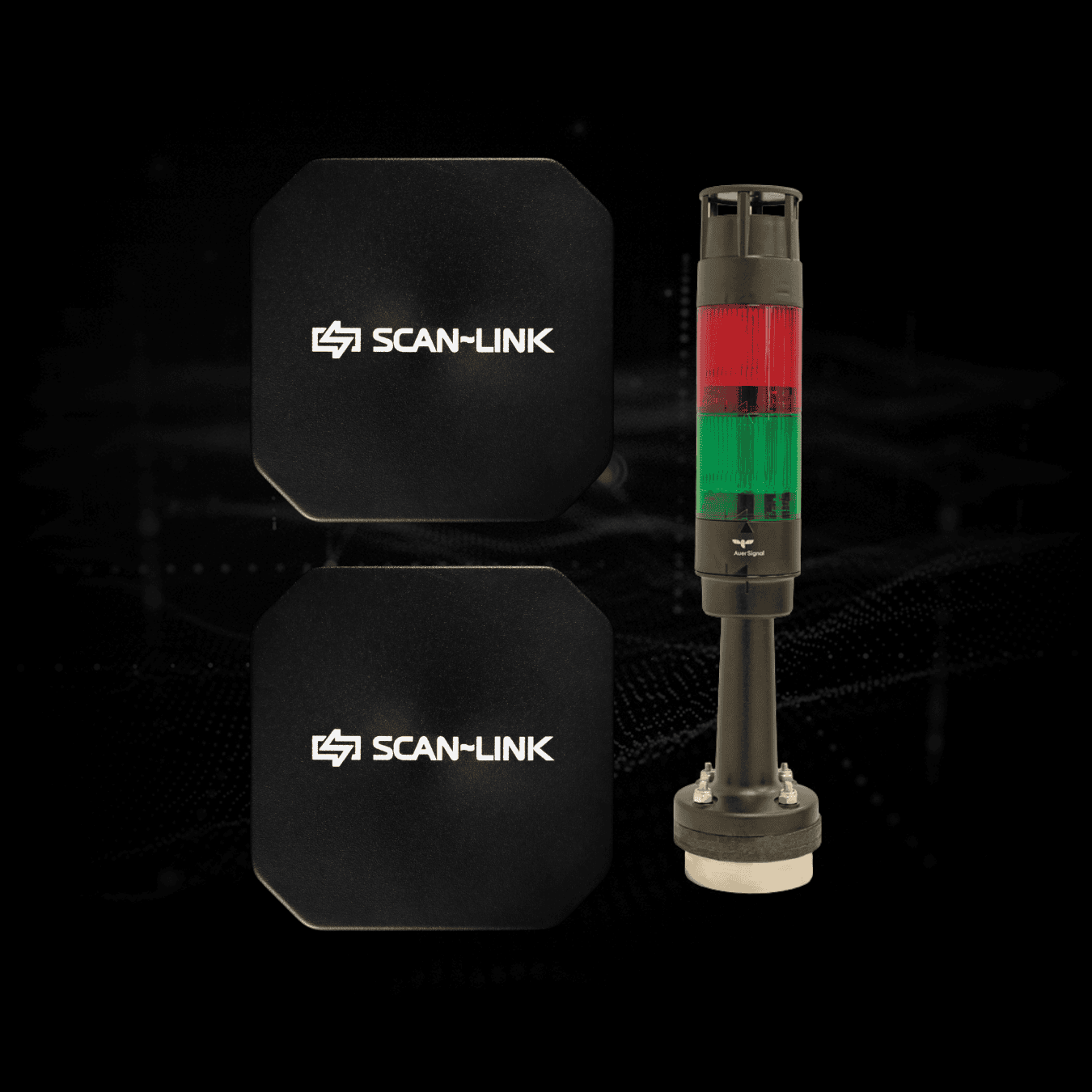 A black compact antenna beside a SCAN~LINK light tower used for conveyor systems