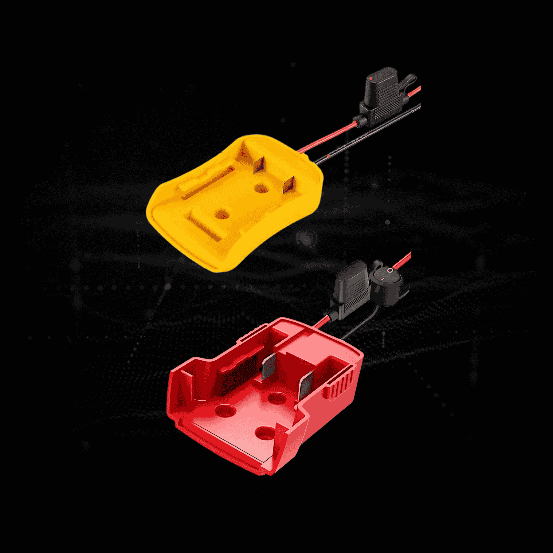 Red and yellow electric connector housings with attached wires on a black background