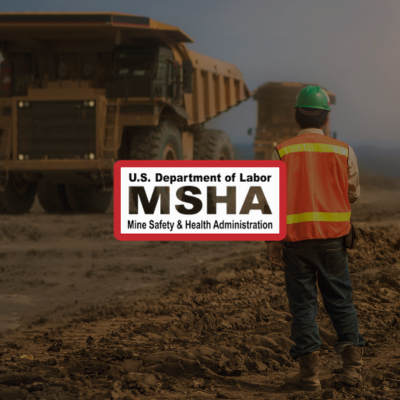 MSHA logo over a mine site with a worker in a green hard hat and orange safety vest