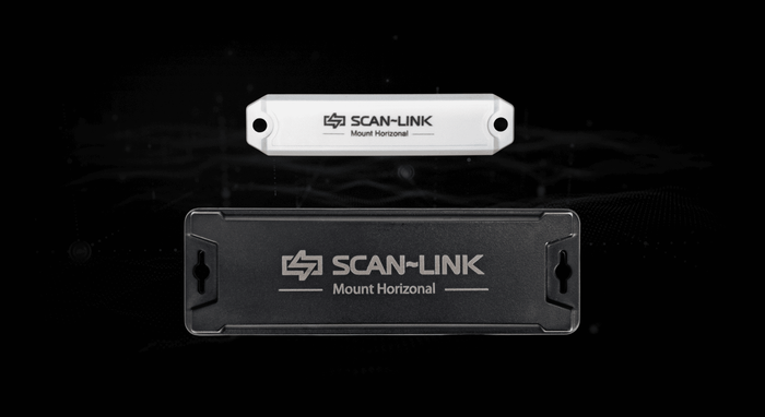 A standard SCAN~LINK Marker Tag and Long Range Marker Tag on a black background