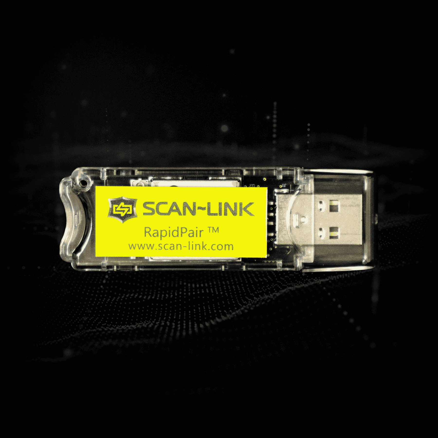 SCAN~LINK RapidPair USB dongle on a black background