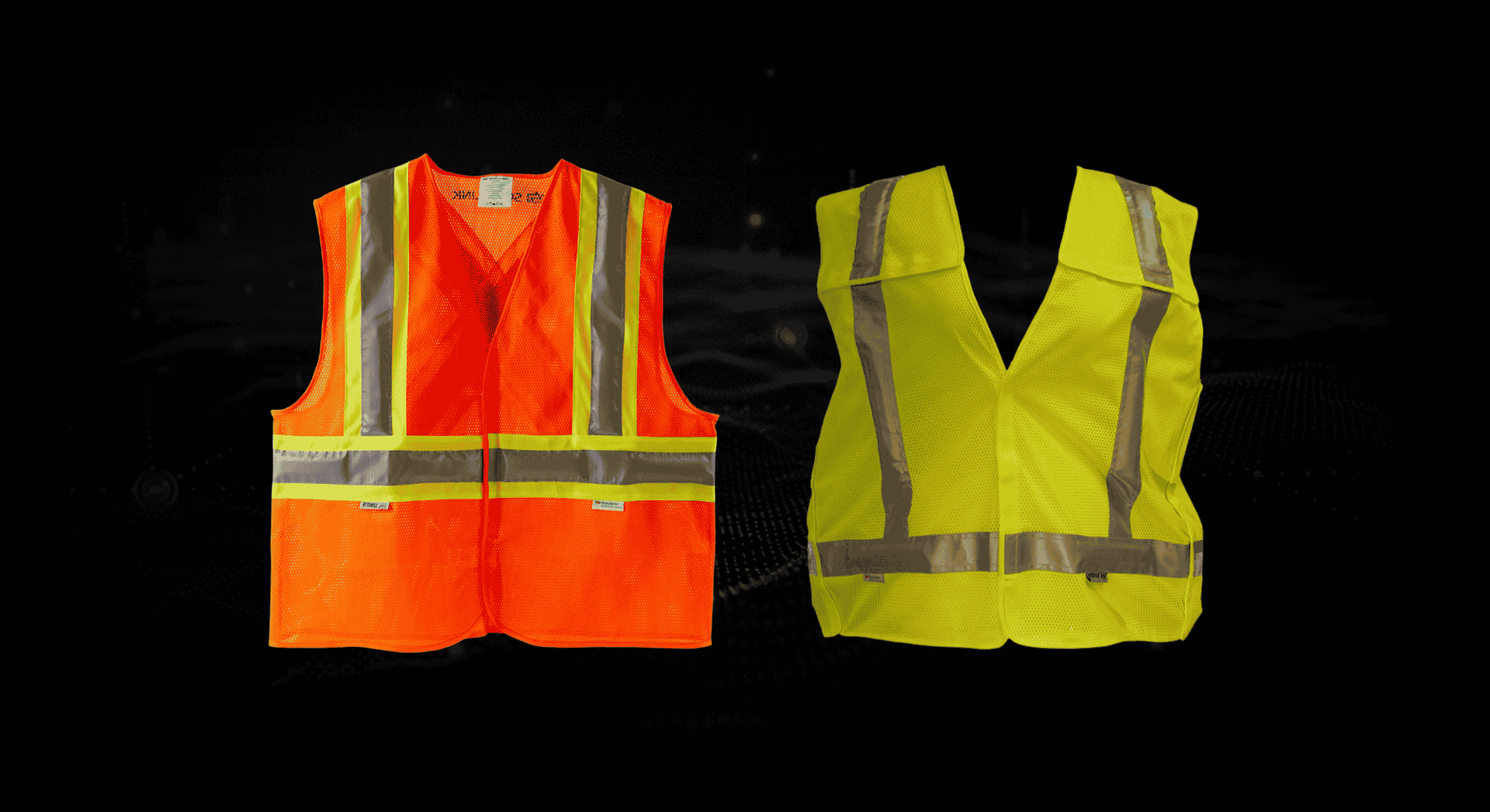 Two high-visibility safety vests, one orange and one yellow, on a black background