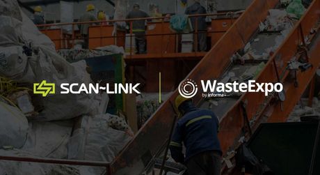 Loader on a forestry site with BC Forest Safety and SCAN~LINK logos