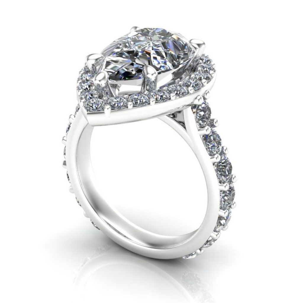 Diamond engagement ring with a large central stone and pavé-set band on a white background