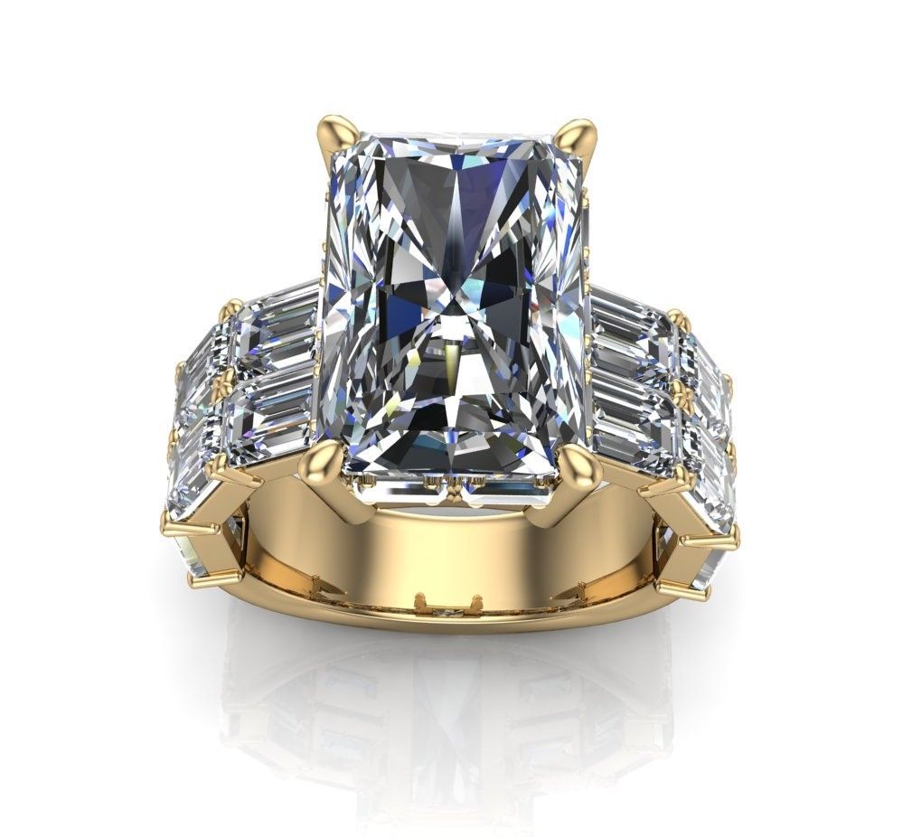 Gold ring with rectangular pink-to-green gemstone and small clear stones