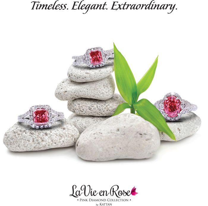Silver diamond ring with a large square-cut center stone on a display stand