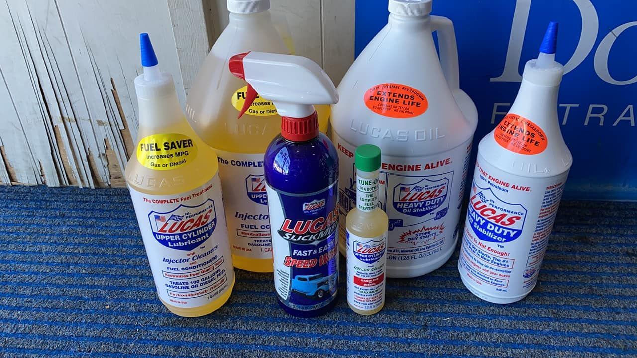 Bottles Of Cleaning Supplies On A Table — Filta-Wash Mackay In North Mackay, QLD