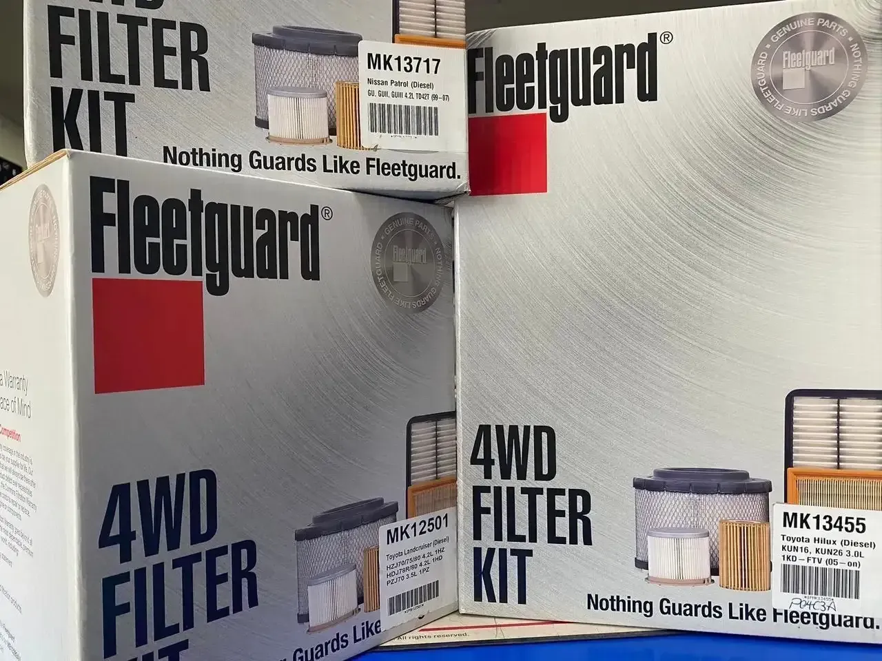 Three Boxes Of Fleetguard 4wd Filter Kits Are Stacked On Top Of Each Other — Filta-Wash Mackay In North Mackay, QLD
