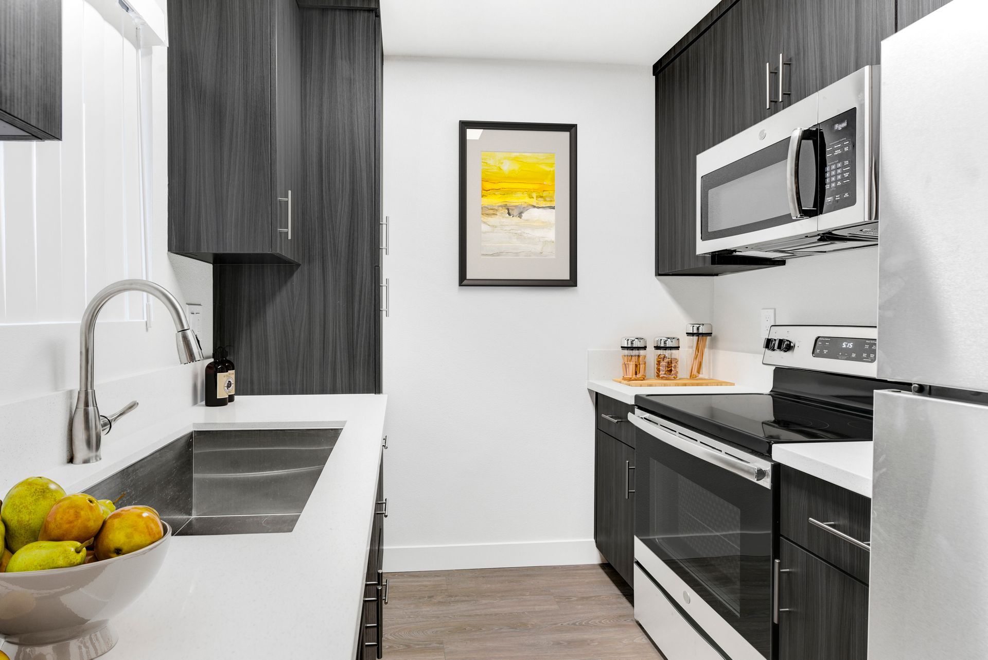 A kitchen with stainless steel appliances.